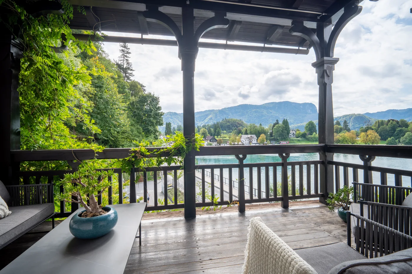 Covered balcony overlooking Lake Bled at the Deluxe Suite