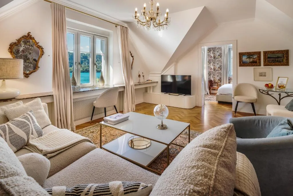 Superior Suite living room with a sofa and lake-facing window